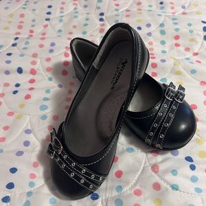Black flats with silver detail